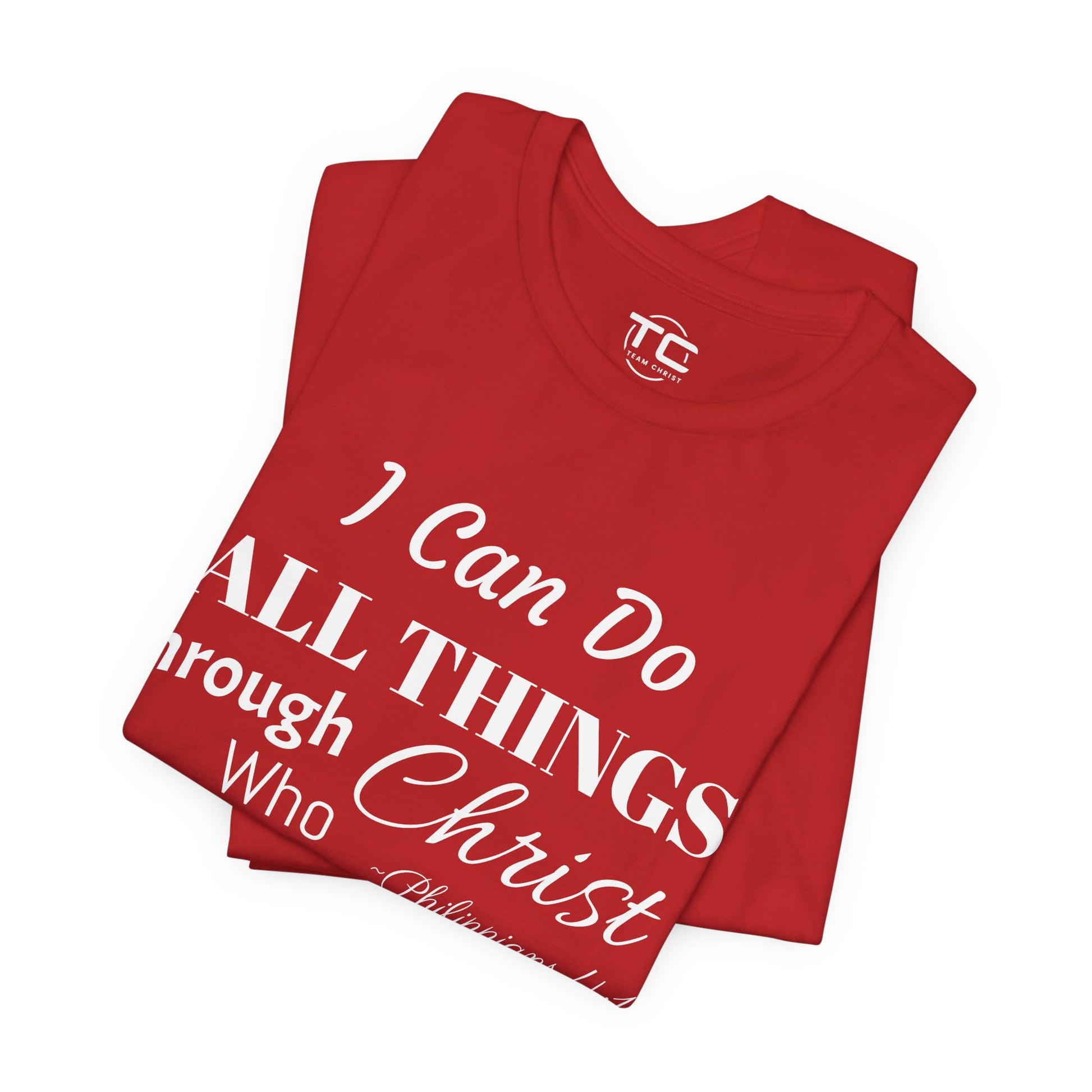 Red Christian themed shirt inspired by Philippians 4:13 featuring a stylish design, perfect for cool Christian tees collection. Folded front Image