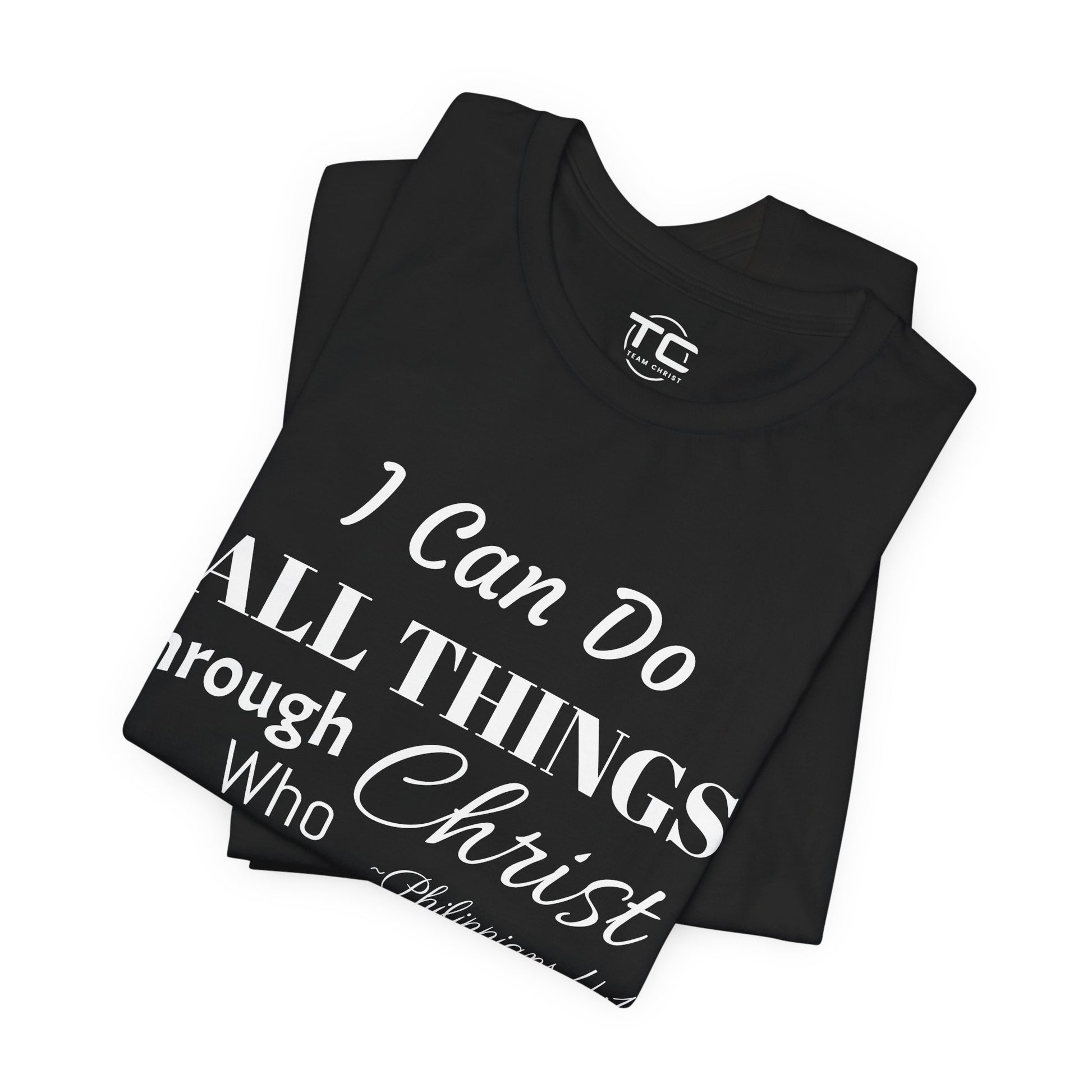 Black Christian themed shirt inspired by Philippians 4:13 featuring a stylish design, perfect for cool Christian tees collection. Folded front Image