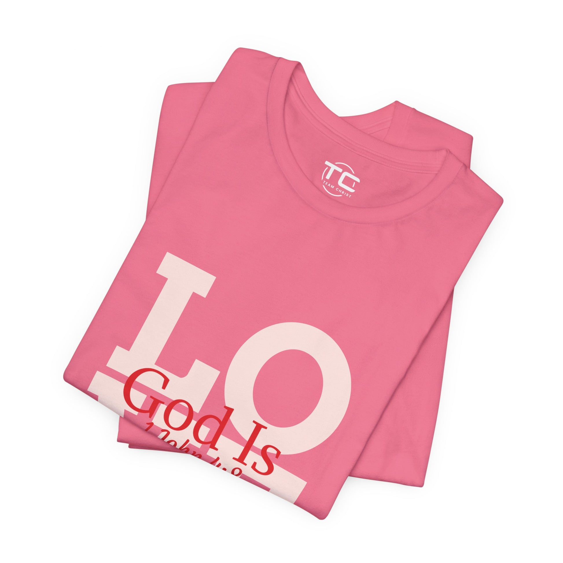 Charity Pink Christian themed shirt inspired by 1 John 4:8 featuring a stylish design, perfect for cool Christian tees collection. Front folded Image